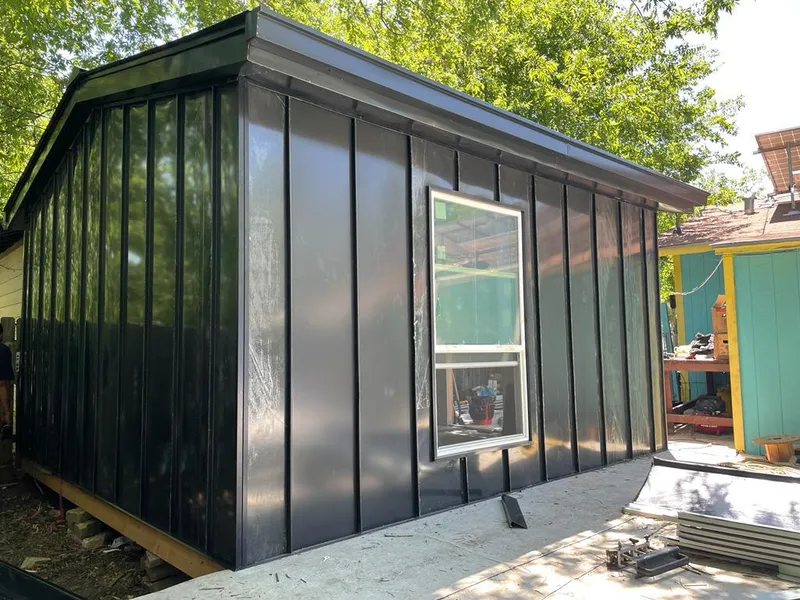 Black standing seam metal wall panels for Metal Roof Installation in Petersburg